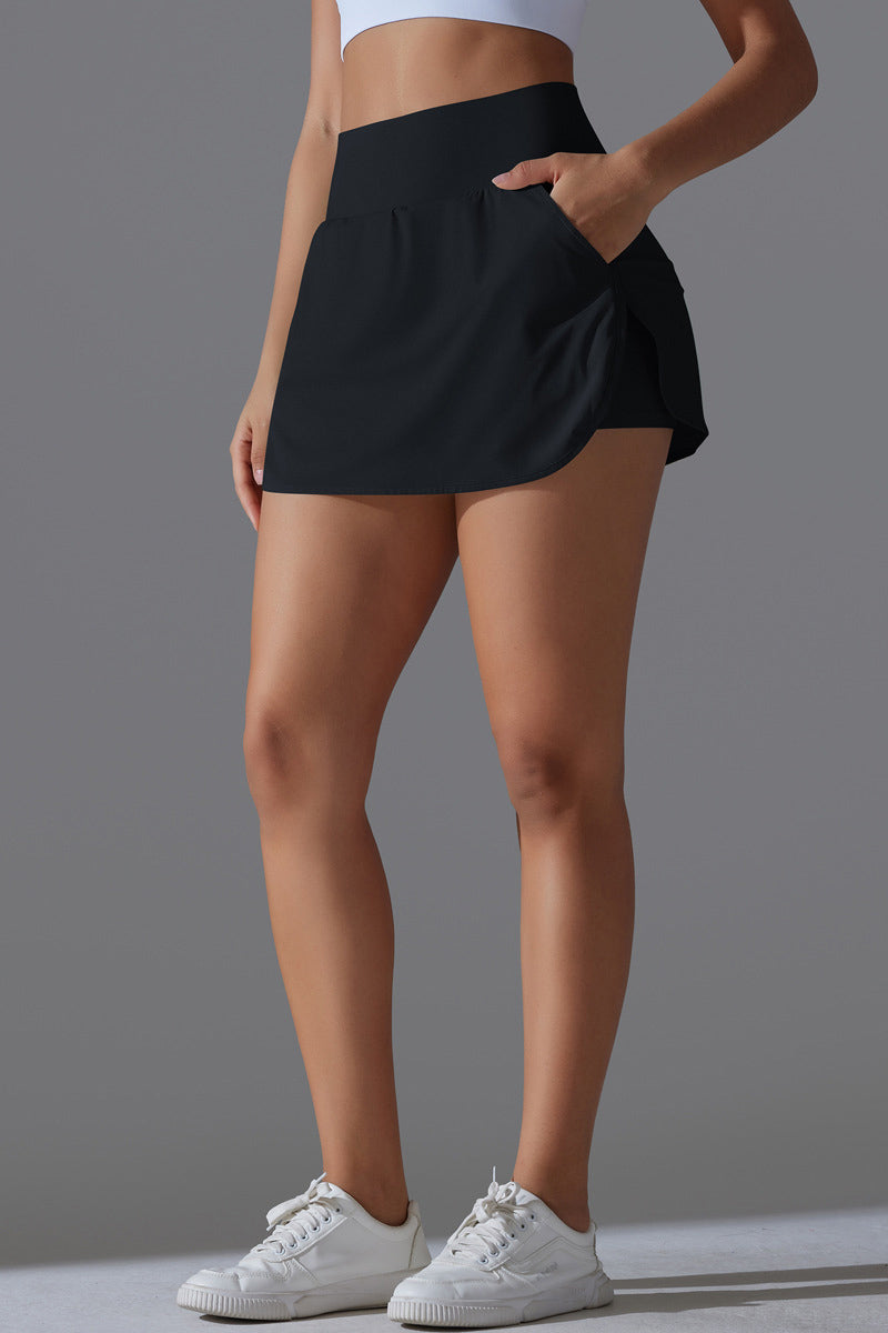 SVL Padel Ace & Allure Skirt in black, featuring a flared design with built-in shorts and 2 pockets, perfect for dynamic movements on the padel court