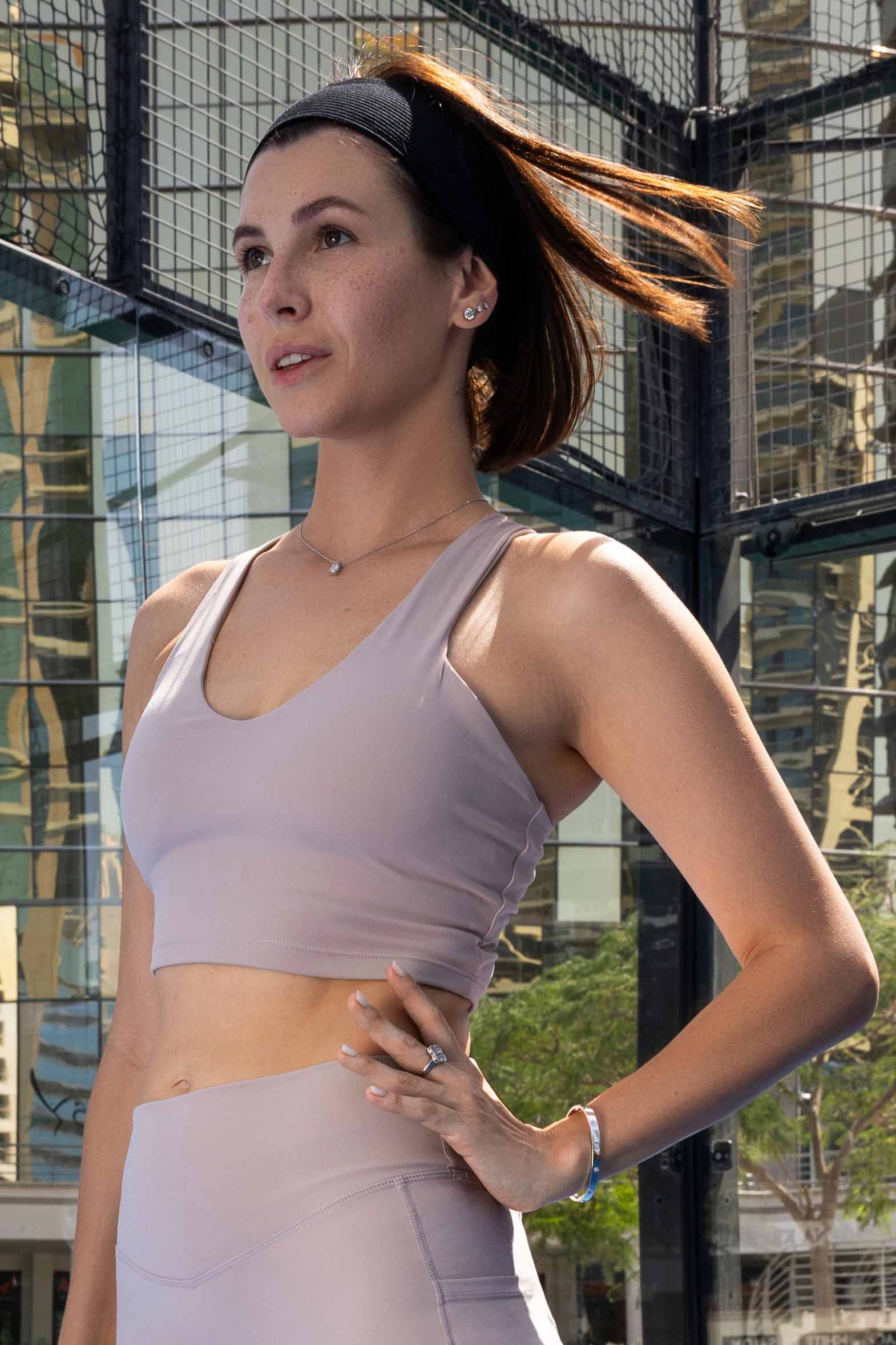 SVL Padel Active Aura Bra in almond, designed with a supportive racerback, moisture-wicking fabric, and a snug fit to ensure comfort during intense padel sessions