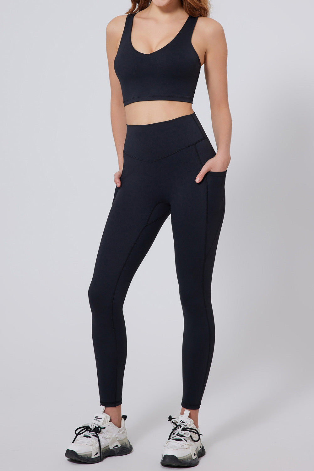 SVL Padel Active Aura Bra in black, designed with a supportive racerback, moisture-wicking fabric, and a snug fit to ensure comfort during intense padel sessions