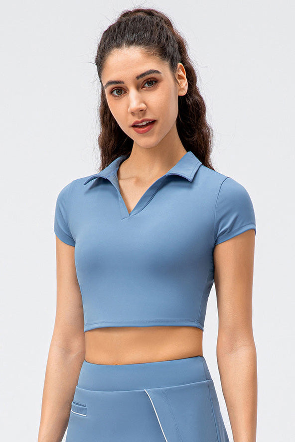 SVL Padel Court & Confidence Top in serene blue, featuring a fitted design with moisture-wicking technology, providing comfort and style for competitive padel play