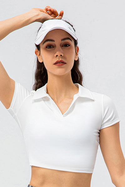 SVL Padel Court & Confidence Top in white, featuring a fitted design with moisture-wicking technology, providing comfort and style for competitive padel play