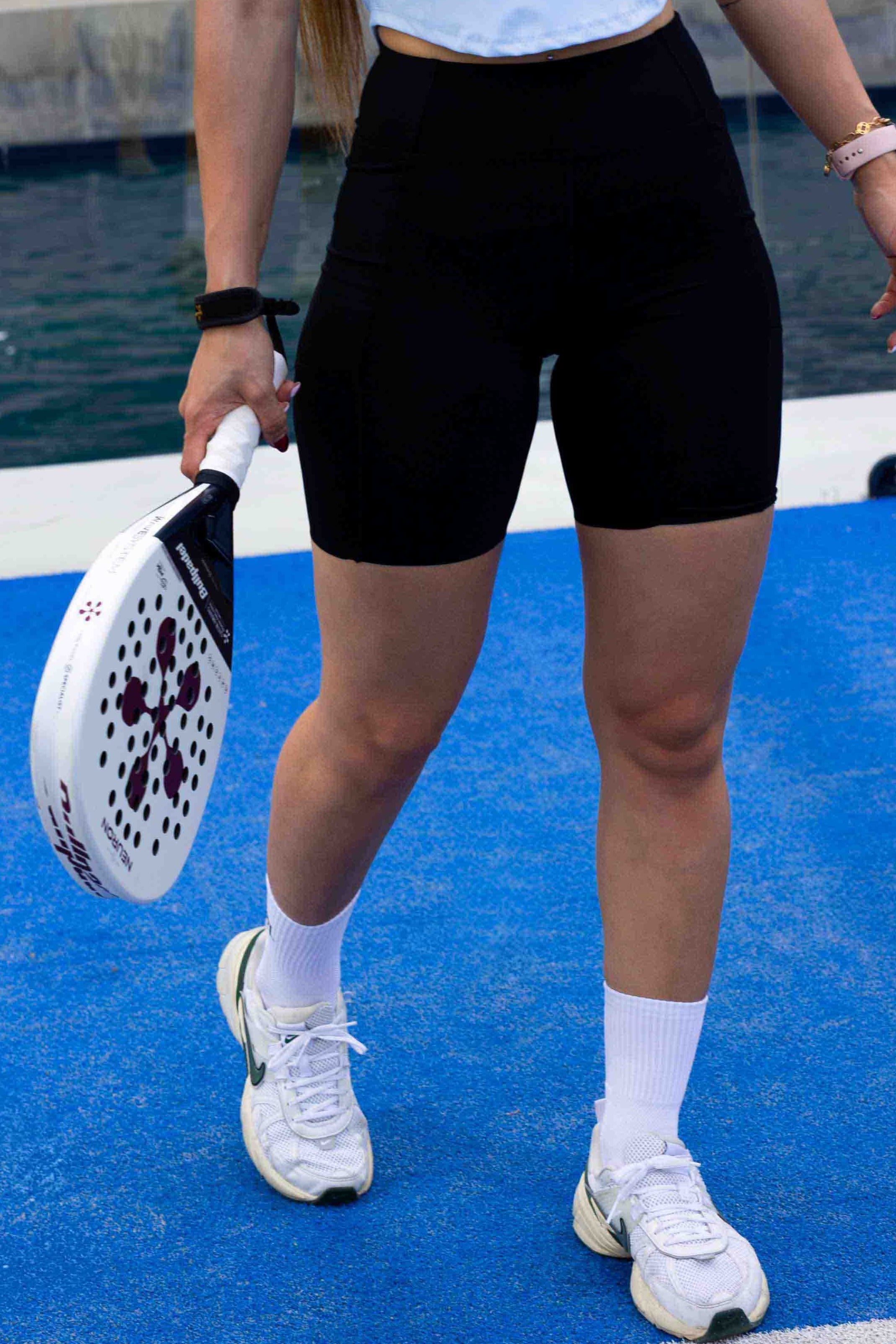 SVL Padel Dynamic Drift Shorts in black, featuring quick-dry material, side pockets, and a drawstring waist, suitable for high-performance padel play