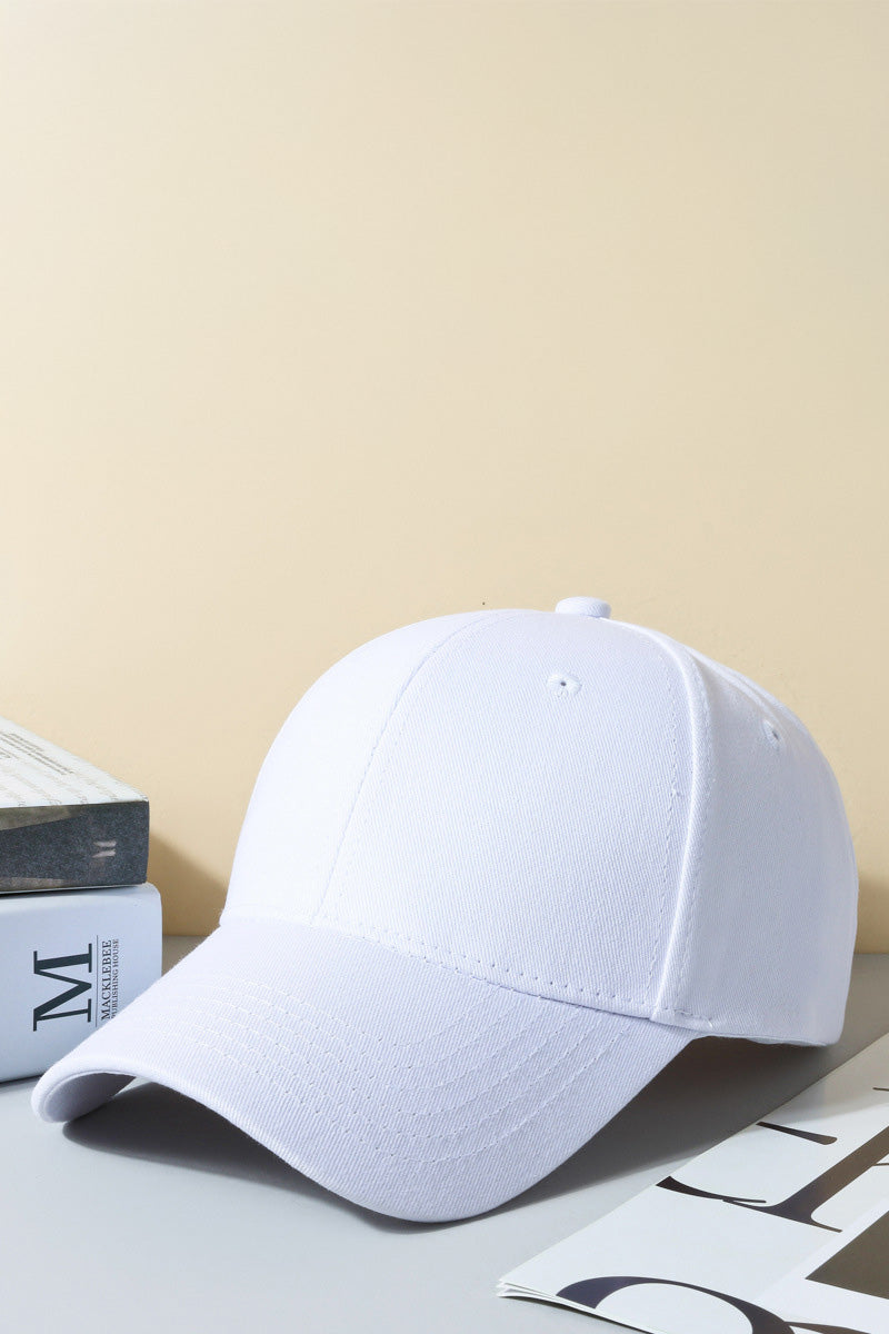 SVL Padel Classic Cap in white, featuring an adjustable strap, curved brim, and embroidered logo, providing stylish sun protection during outdoor padel matches
