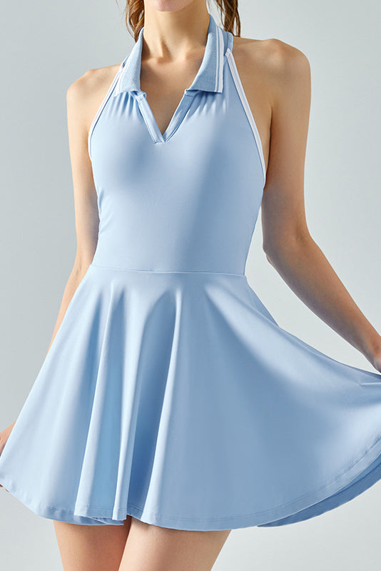 SVL Padel Perfect Polo Dress in sky blue, designed with a classic polo collar, breathable fabric, and built-in shorts, ideal for a polished look on the padel court