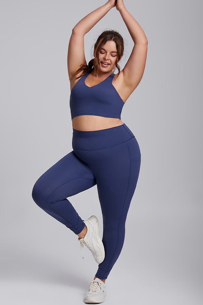 SVL blue leggings Active Aura high waisted performance leggings for padel and tennis styled on curvy female athlete