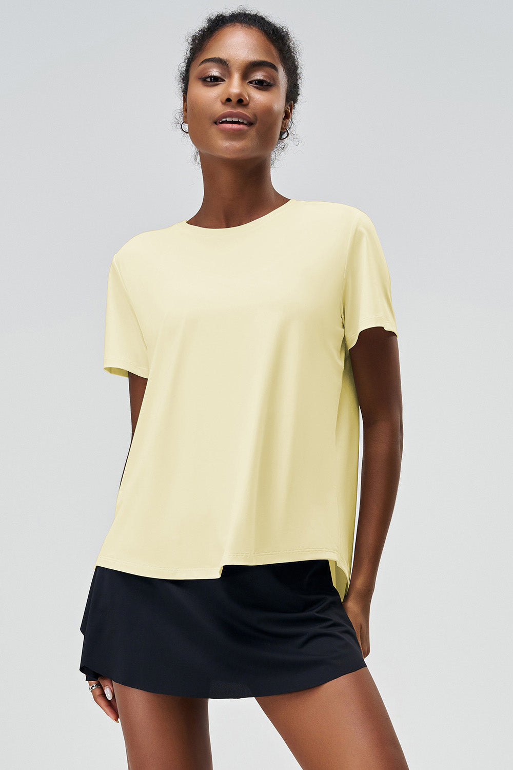 SVL Clara T-shirt in yellow, women’s performance padel and tennis t-shirt with relaxed fit