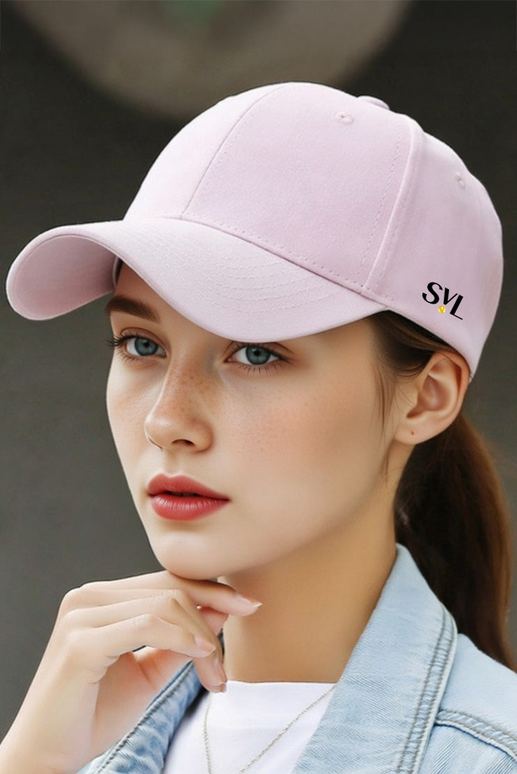Female padel player wearing SVL Classic Cap in pink for padel and tennis matches
