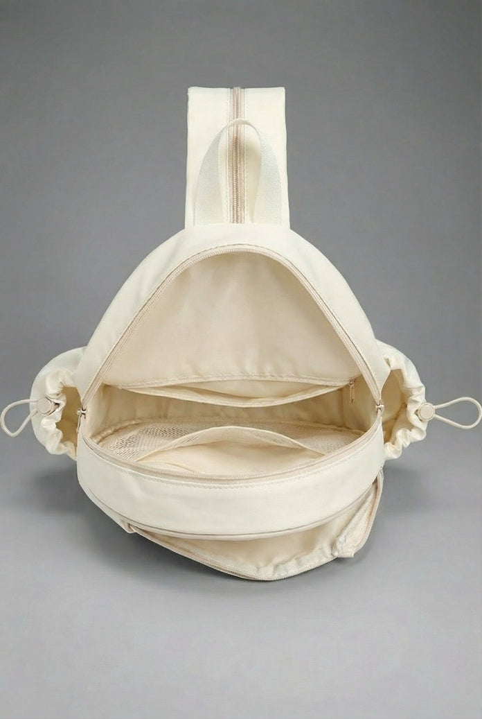 Interior view of the SVL luxury padel backpack showing organized storage compartments and mesh internal pockets for personal items.