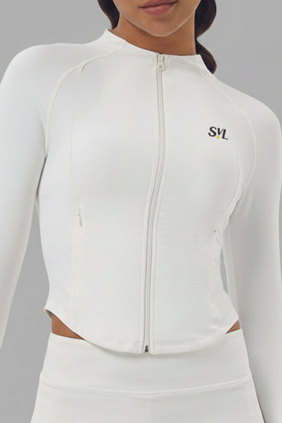 Close-up of the white Swan Sway tennis jacket featuring a sleek full-zip front, high collar, and the SVL brand logo on the chest.
