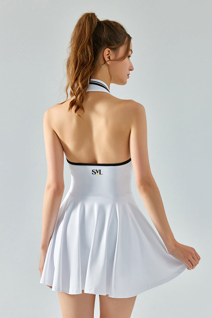 Back view of SVL white tennis and padel dress Perfect Polo flared performance dress for women