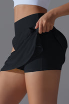 SVL Padel Ace & Allure Skirt in black, featuring a flared design with built-in shorts and 2 pockets, perfect for dynamic movements on the padel court