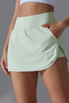 SVL Padel Ace & Allure Skirt in soft green, featuring a flared design with built-in shorts and 2 pockets, perfect for dynamic movements on the padel court