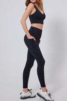SVL Padel Active Aura Leggings in black, offering a high-waisted fit with compression support, crafted from stretchable, breathable material ideal for padel activities