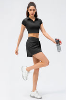 SVL Padel Court & Confidence Skirt in black, designed with a streamlined fit, built-in shorts, and stretch fabric, ensuring confidence and freedom of movement on the padel court