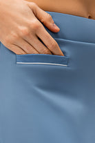 SVL Padel Court & Confidence Skirt in serene blue, designed with a streamlined fit, built-in shorts, and stretch fabric, ensuring confidence and freedom of movement on the padel court