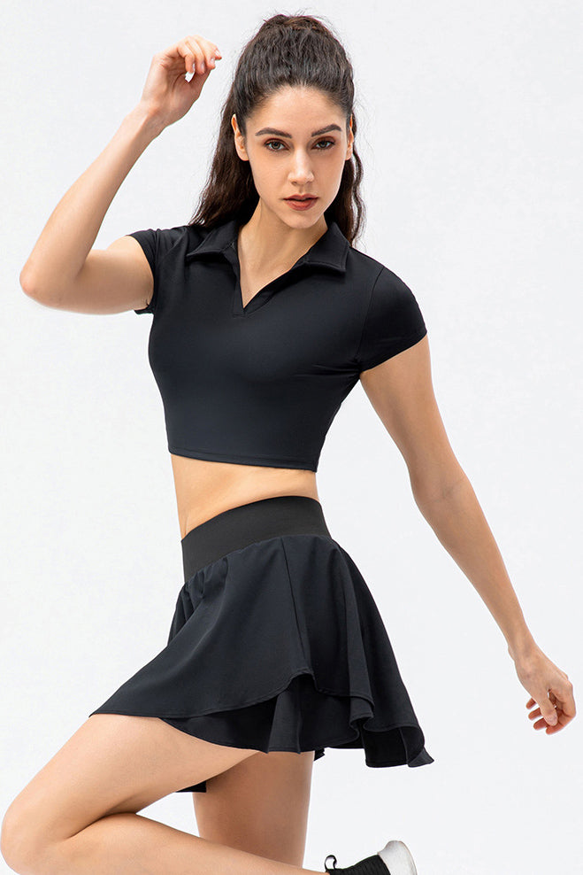 SVL Padel Court & Confidence Top in black, featuring a fitted design with moisture-wicking technology, providing comfort and style for competitive padel play