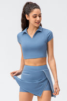 SVL Padel Court & Confidence Top in serene blue, featuring a fitted design with moisture-wicking technology, providing comfort and style for competitive padel play