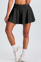 SVL Padel Featherlight & Flow Skirt in black, offering a flowy silhouette with built-in shorts, constructed from breathable fabric for optimal performance during padel matches