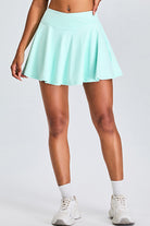 SVL Padel Featherlight & Flow Skirt in turquoise, offering a flowy silhouette with built-in shorts, constructed from breathable fabric for optimal performance during padel matches