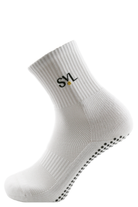 SVL white padel socks with compression fit, reinforced heel and toe cushioning, anti-slip grip, and mesh ventilation zones for breathability. 