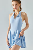 SVL Padel Perfect Polo Dress in sky blue, designed with a classic polo collar, breathable fabric, and built-in shorts, ideal for a polished look on the padel court