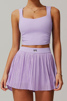 SVL Padel Plush Pleat Set in Lavender – a stylish and performance-driven outfit featuring a pleated skirt with built-in shorts and a matching top with a squared neckline. Crafted from lightweight, soft-touch fabric, this set ensures breathability, comfort, and unrestricted movement, making it the perfect choice for padel players who want to play in style.