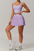SVL Padel Plush Pleat Set in Lavender – a stylish and performance-driven outfit featuring a pleated skirt with built-in shorts and a matching top with a squared neckline. Crafted from lightweight, soft-touch fabric, this set ensures breathability, comfort, and unrestricted movement, making it the perfect choice for padel players who want to play in style.