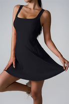 SVL Padel Sweet Swirl Dress in black, showcasing a swirling pattern, comfortable fit, and built-in shorts, perfect for both padel games and casual outings
