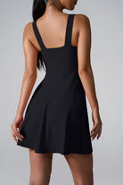 SVL Padel Sweet Swirl Dress in black, showcasing a swirling pattern, comfortable fit, and built-in shorts, perfect for both padel games and casual outings