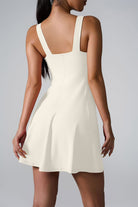 SVL Padel Sweet Swirl Dress in ivory, showcasing a swirling pattern, comfortable fit, and built-in shorts, perfect for both padel games and casual outings