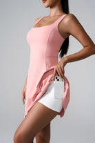 SVL Padel Sweet Swirl Dress in pink, showcasing a swirling pattern, comfortable fit, and built-in shorts, perfect for both padel games and casual outings