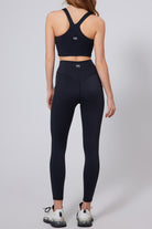 Back view of SVL black leggings Active Aura high waisted athletic leggings for padel and tennis