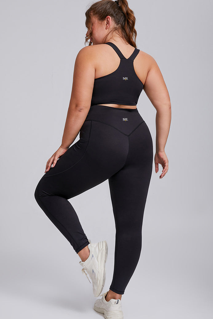 Back view of SVL black leggings Active Aura high waisted plus size leggings with pocket designed for padel and tennis