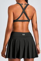 Back view of SVL black padel and tennis skirt Featherlight and Flow athletic skort for women