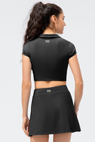 Back view of SVL black tennis and padel skirt Court and Confidence high waisted black athletic skirt