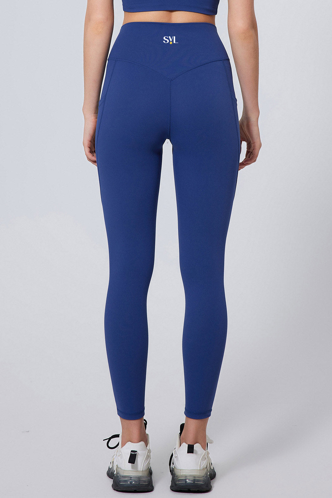 Back view of SVL blue leggings Active Aura high waisted leggings for padel and tennis players