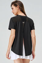 Back view of SVL Clara T-shirt in black designed for performance padel and tennis wear
