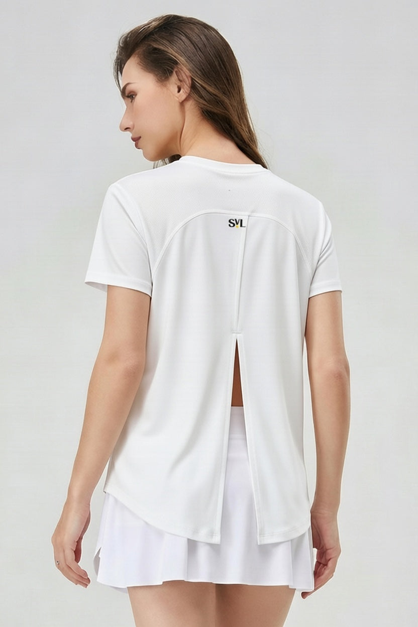 Back view of SVL Clara T-shirt in white for padel and tennis players