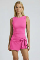 SVL dark pink tennis and padel dress Play and Party fuchsia sleeveless performance dress for women