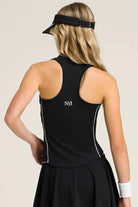 Rear view of the black SVL Kate top highlighting the athletic racerback silhouette and the SVL brand logo.