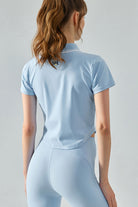 Back view of SVL light blue polo t-shirt Perfect Polo for padel and tennis players