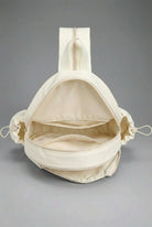 Interior view of the SVL luxury padel backpack showing organized storage compartments and mesh internal pockets for personal items.