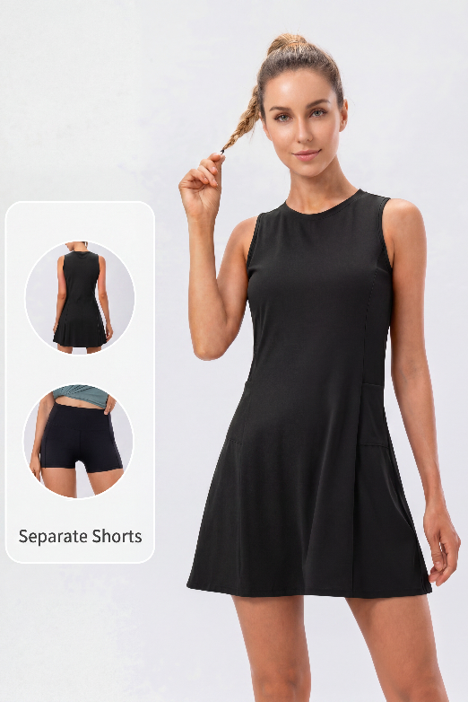 Women padel player wearing a black padel dress with built-in shorts and pockets