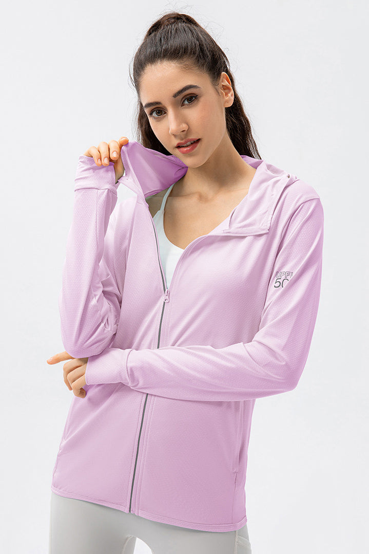 Front view of the SVL Maya Jacket in lavender, a lightweight SPF 50 performance tunic with long sleeves and side pockets for women.