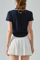 Back view of SVL navy polo t-shirt Perfect Polo designed for padel and tennis players