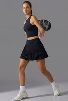 SVL Maria Skirt - a pleated black padel and tennis skirt for women