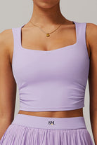 SVL purple tennis and padel crop top Plush Pleat fitted athletic top for women