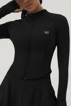 Close-up front view of the black Swan Sway performance jacket featuring a full zipper, high collar, and the SVL brand logo.