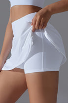 SVL white tennis skort with inner shorts Ace and Allure performance skirt for women