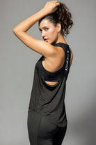 Back view of SVL Yasmine T-shirt in black designed for padel and tennis players
